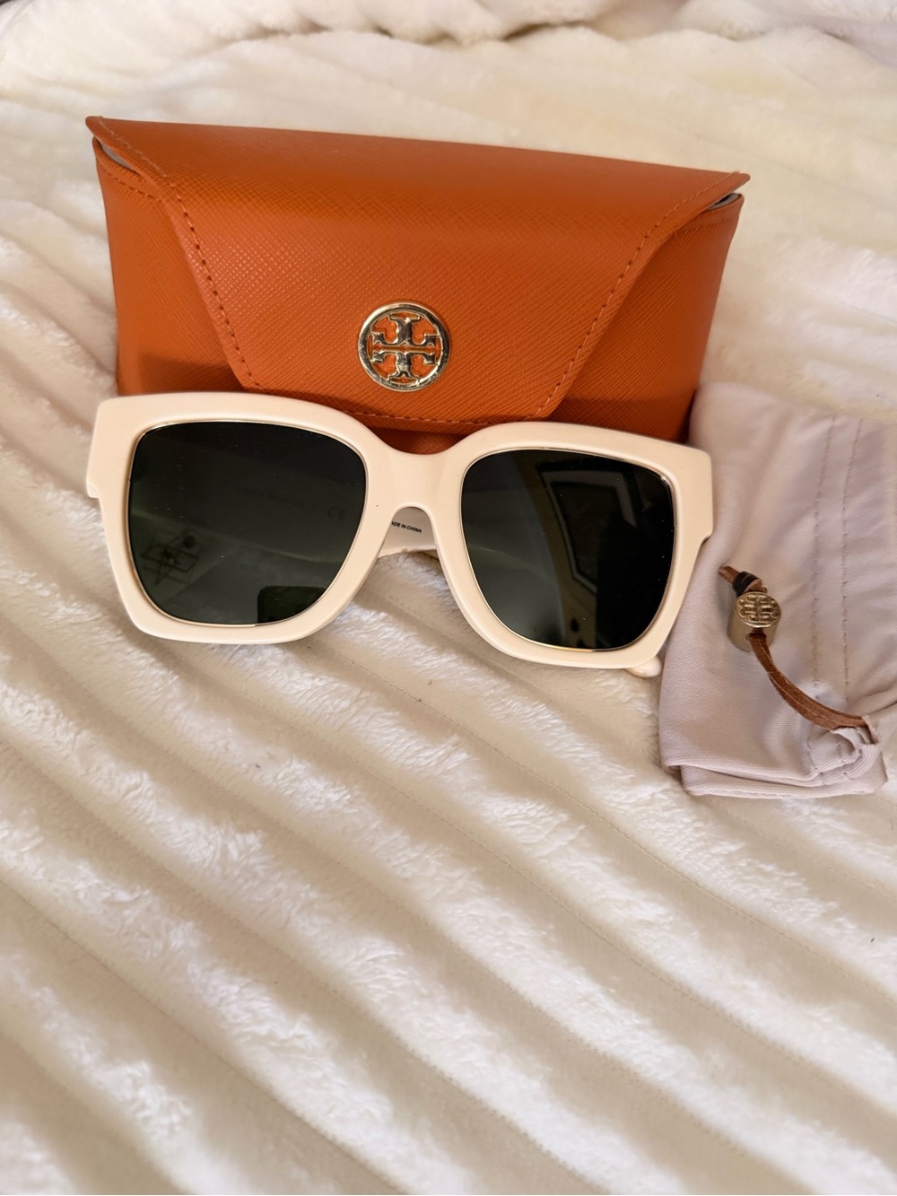 Tory Burch Kira square sunglasses.